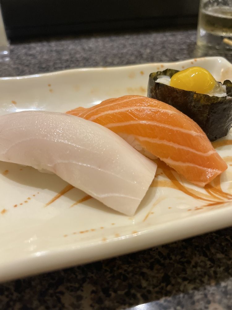 Escolar and salmon nigiri